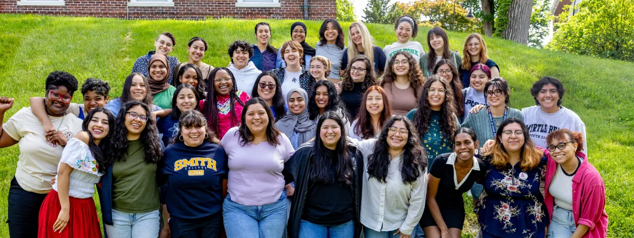 A group of students gathered at commencement rehearsal.