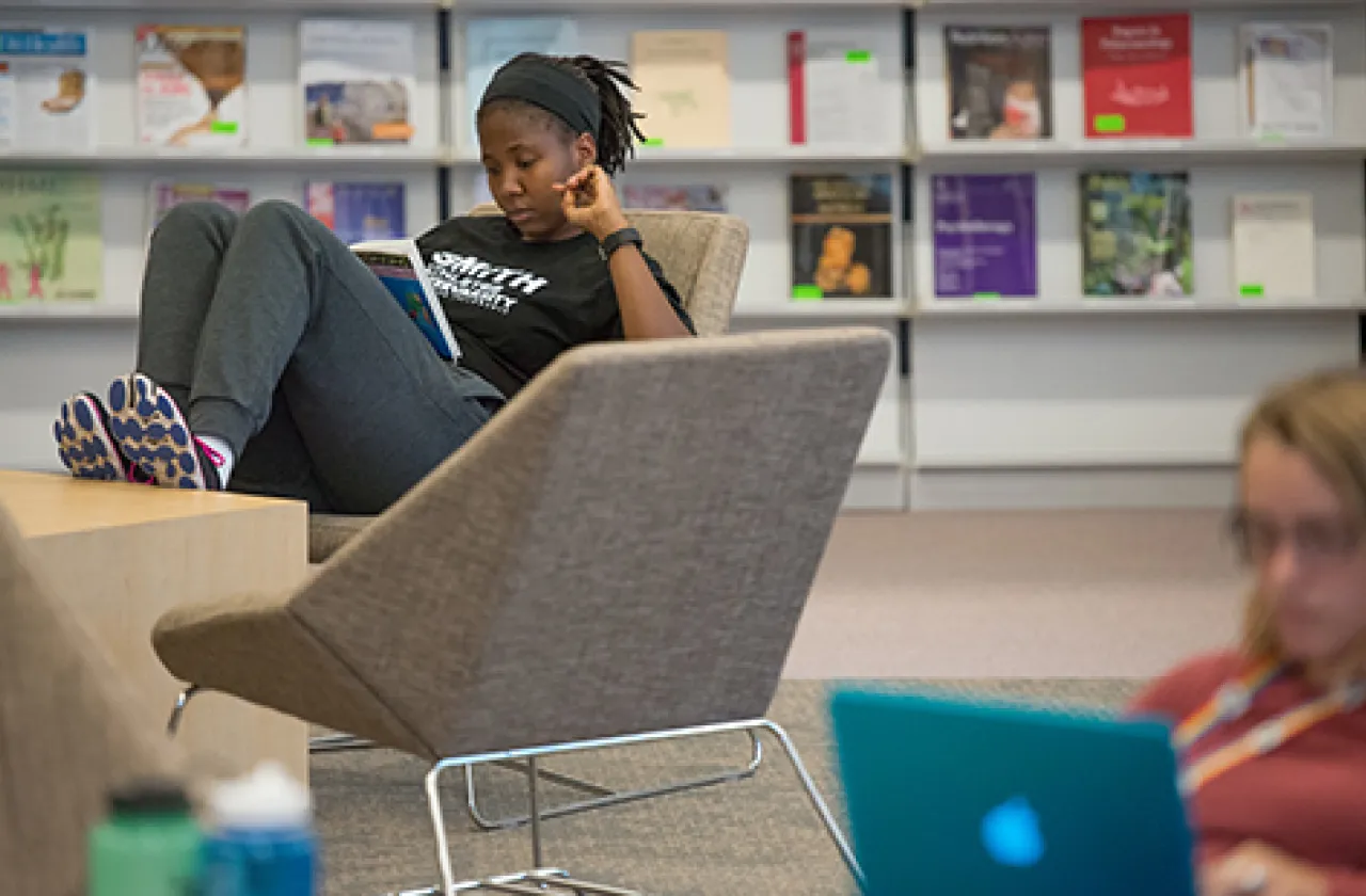 Students on computers in Young Science Library