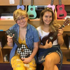 Students with ukuleles for loan in Josten Library