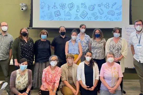 faculty and staff gathering in a classroom