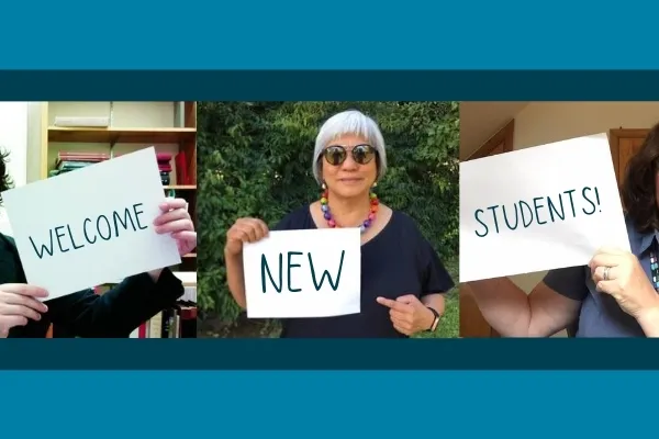 Micah Walter, Marlene Wong, and Jean Ferguson holding up signs saying Welcome New Students