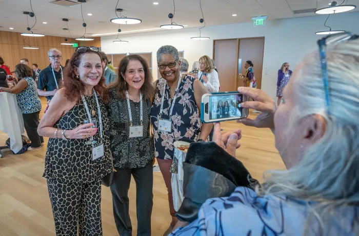 Alums pose for a photo during Reunion