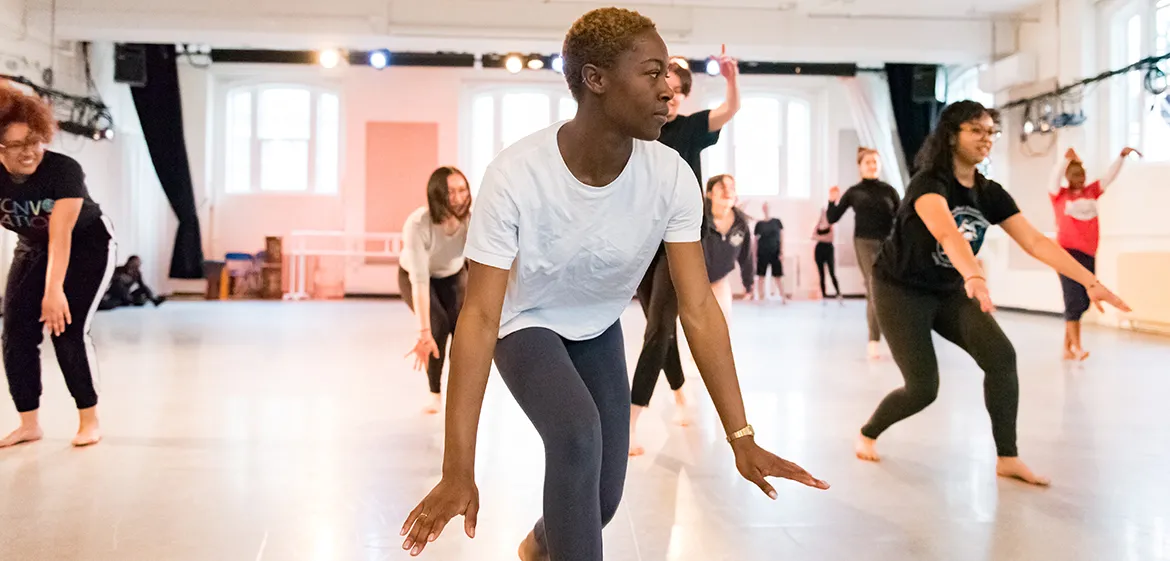 A group of dancers rehearse in Scott Dance Studio