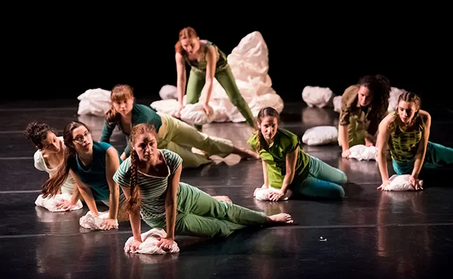 Large group of dancers in performance